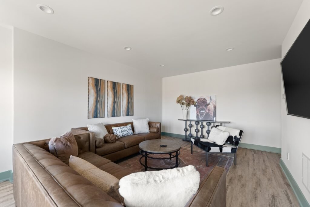 Open living and dining area at Tatanka Overlook lodge, steps from the ground-level guest room